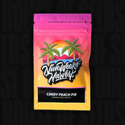 Leuchtende Verpackung von Nine Weeks Harvest mit Sonnenuntergang und Palmen für Candy Peach Pie